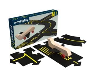 Toy runway set with wooden airplane and road pieces.
