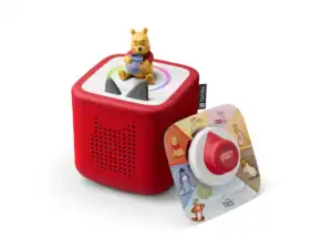 Toy speaker with character figure on top.