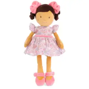 Plush doll wearing pink floral dress and pink shoes.