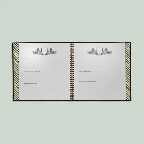 Open Christmas memory journal with lined pages.