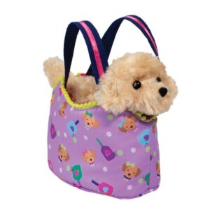 Stuffed puppy toy in a purple patterned bag.