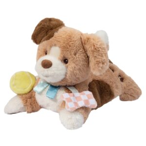 Plush toy dog with tennis ball and ribbons.