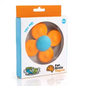 Whirly Squigz orange spinner toy in packaging.