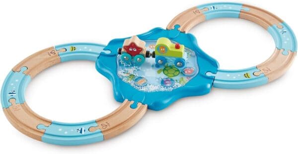 Wooden toy train track with sea theme.