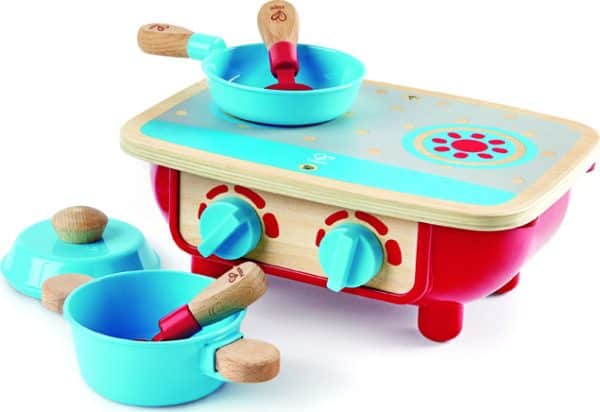 Colorful toy stove with pots and utensils.