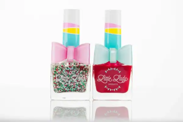 Colorful nail polish bottles with bow accents.