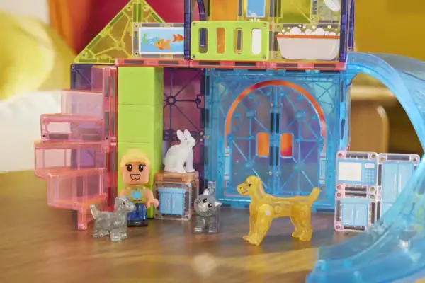 Colorful block toy set with animals and figure.