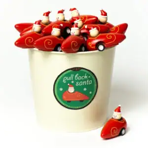 Tin of pull-back toy Santas