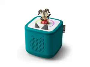Toy speaker with dog figure on top.