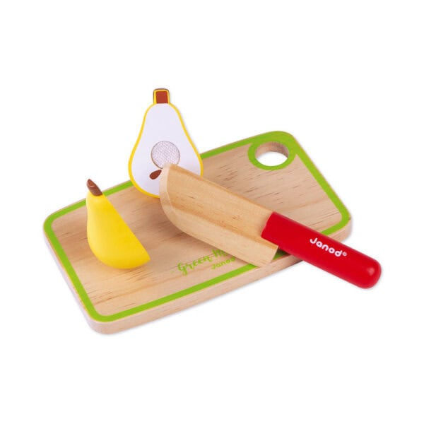 Wooden toy pear and knife set on board.