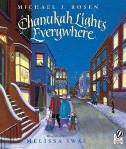 Family walking during Chanukah in winter city streets.