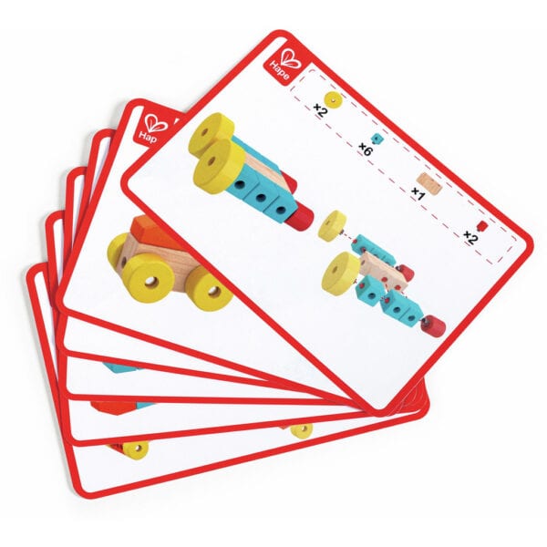 Toy assembly instructions on colorful cards.