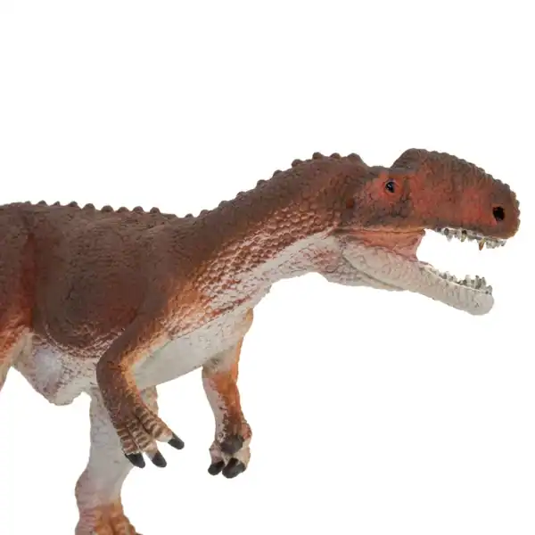 Dinosaur toy figure with open mouth.
