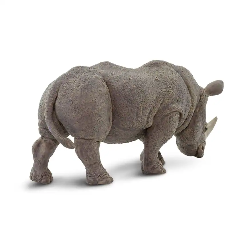 Gray rhinoceros figurine on white background.