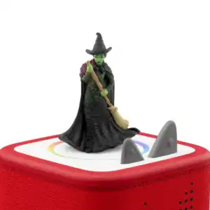 Witch figurine on red audio box.