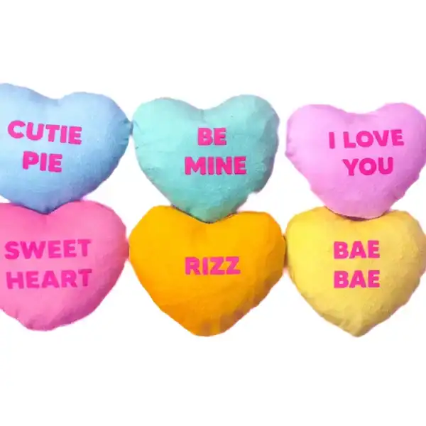 Colorful heart pillows with romantic messages