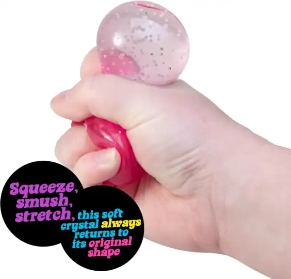 Hand squeezing a pink stress ball.