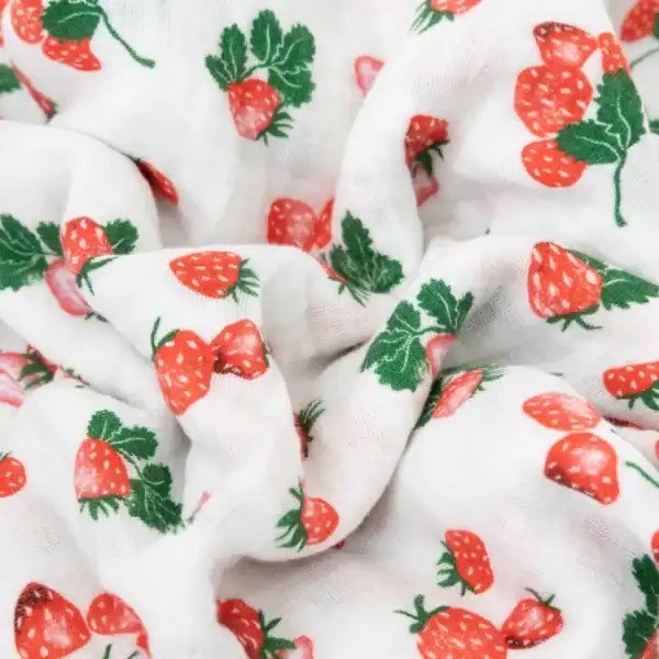 White fabric with red strawberry pattern