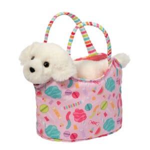 White plush dog in colorful candy-patterned tote bag.