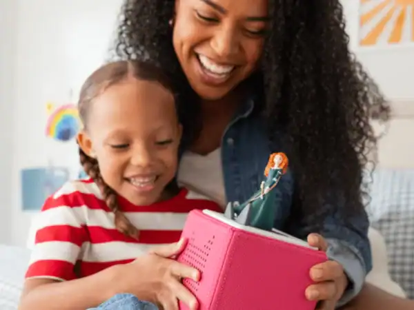 Mother and child with storytelling speaker