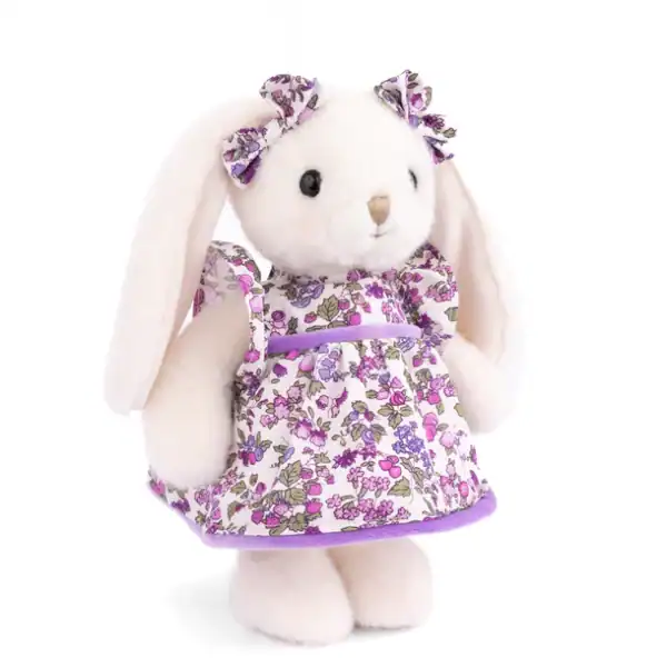 Cute plush bunny in floral dress with bows.