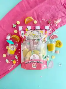 Lemonade toy set with colorful decorations on table.
