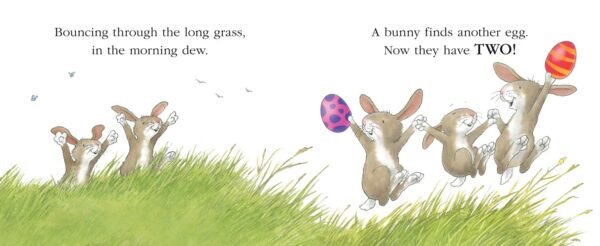Bunnies find two colorful eggs in grass.