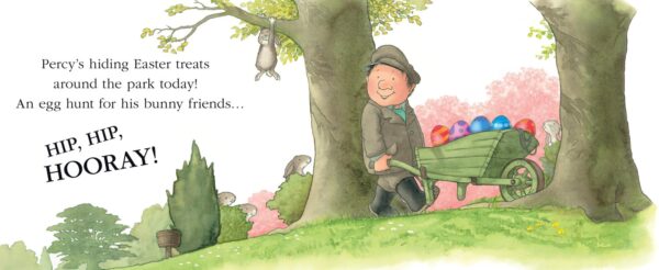 Man with wheelbarrow full of colorful Easter eggs.