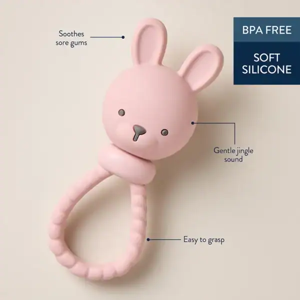 Pink bunny teether soothes gums, BPA-free soft silicone.