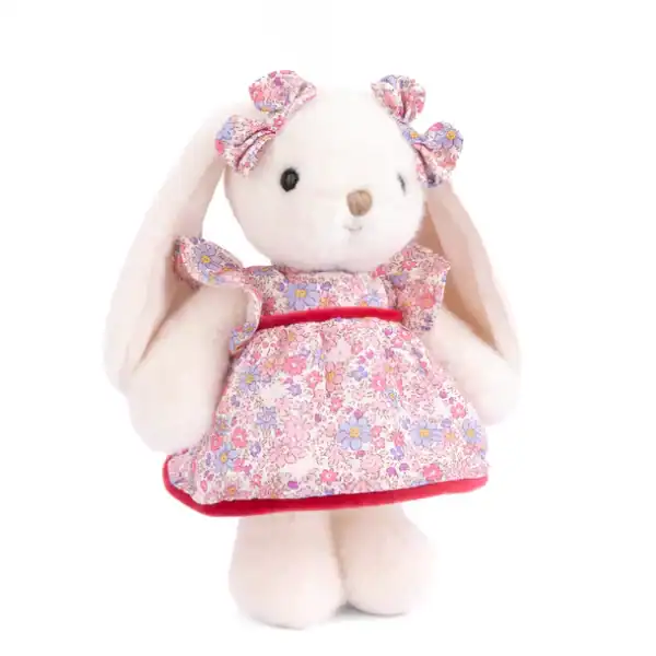 Plush bunny in floral dress with pink bows.