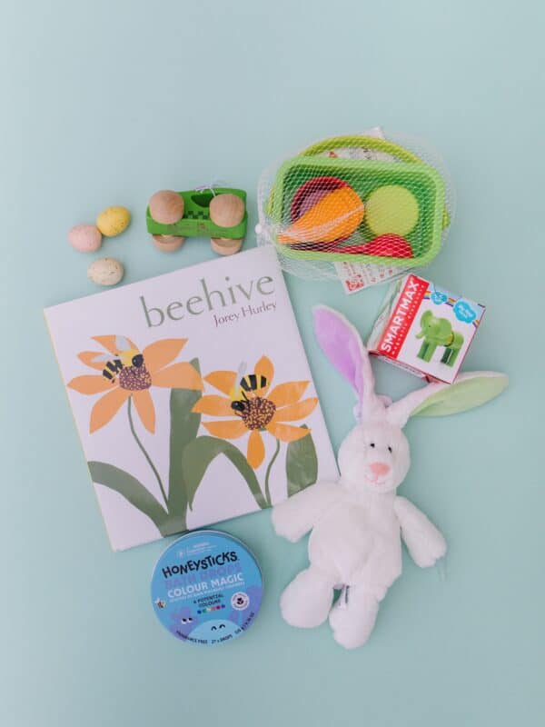 Children's toys and book on a light background