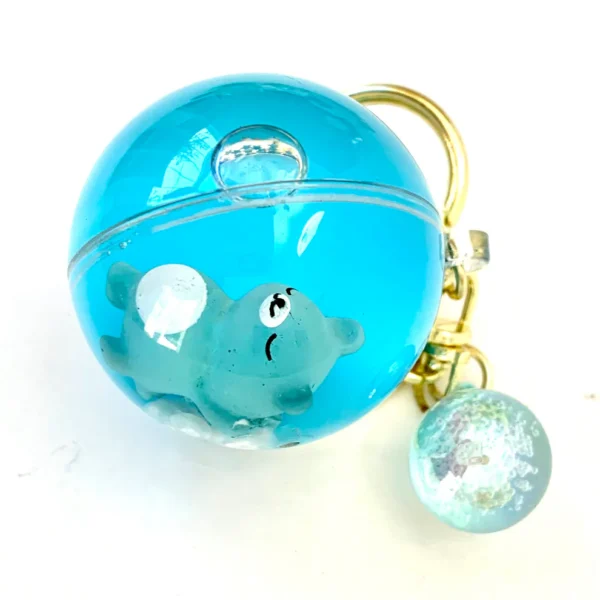 sleeping animal ball key charm