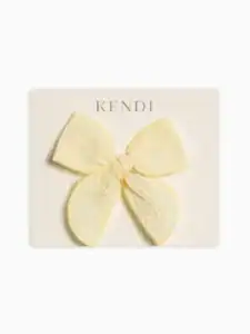 kendi butter eyelet bow clip